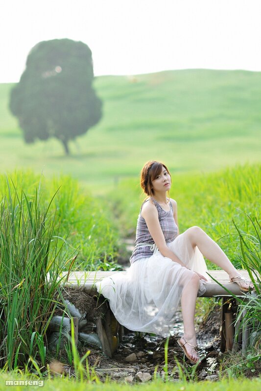 Woman in a green field