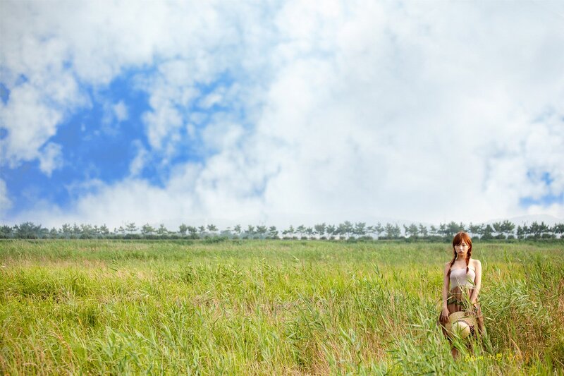 Woman in a green field