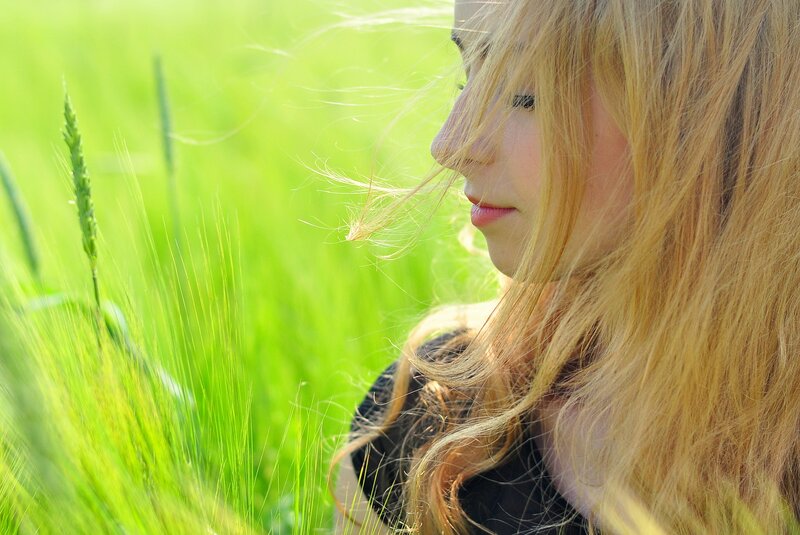woman in a green field