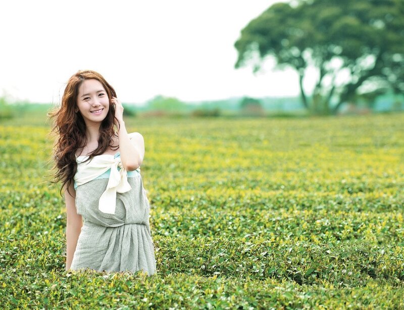 woman in a green field