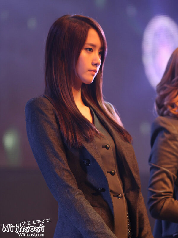woman in a grey blazer