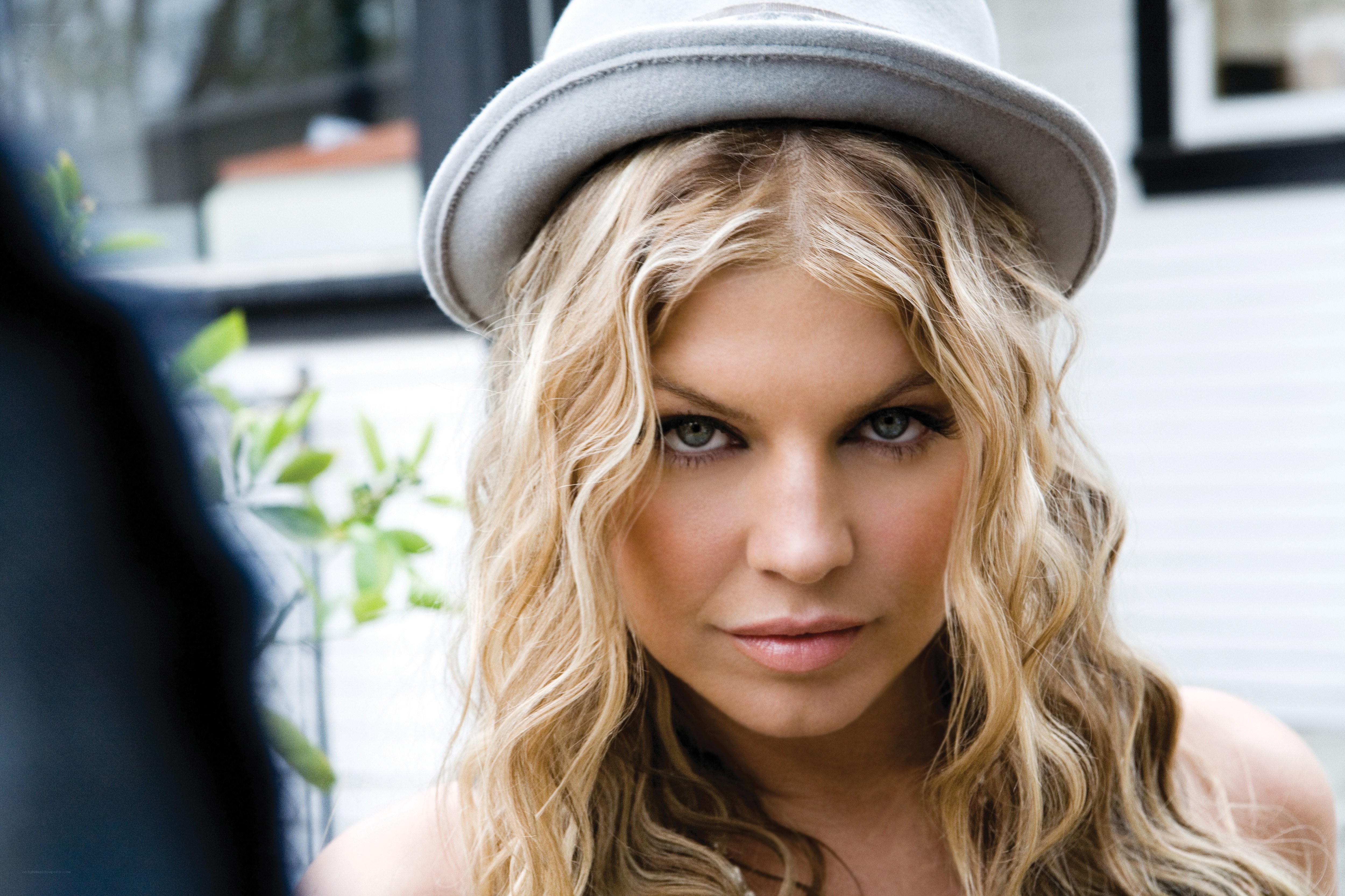 woman in a grey hat