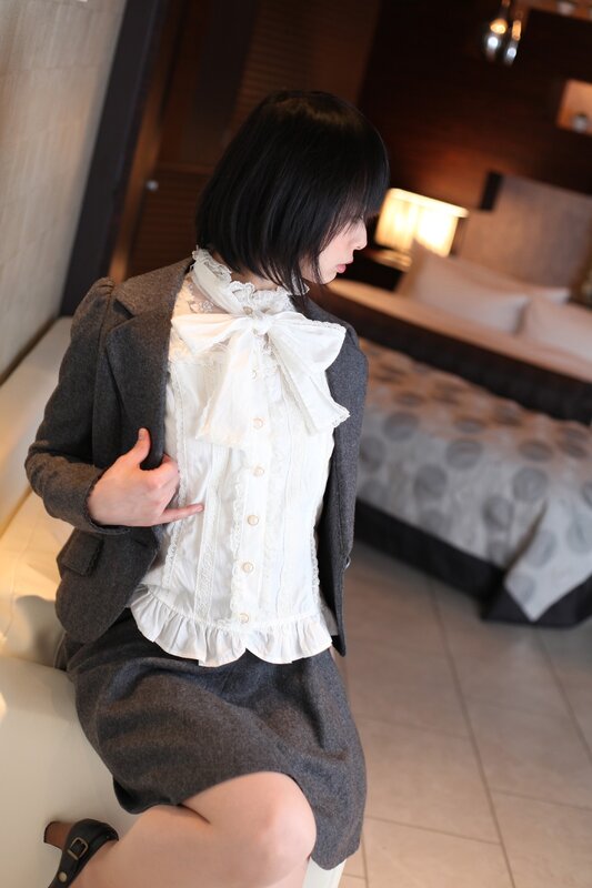 woman in a grey suit