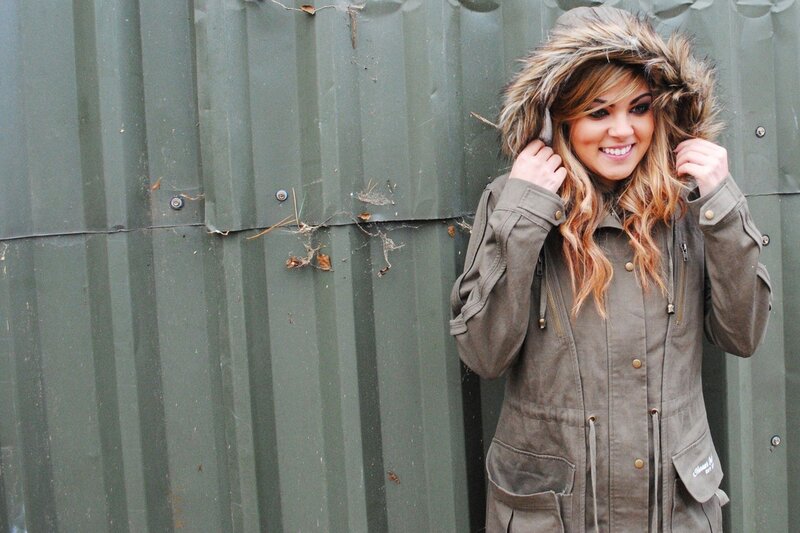 woman in a hooded coat