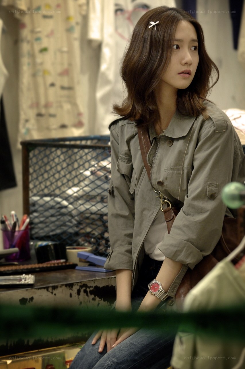 woman in a jacket sitting