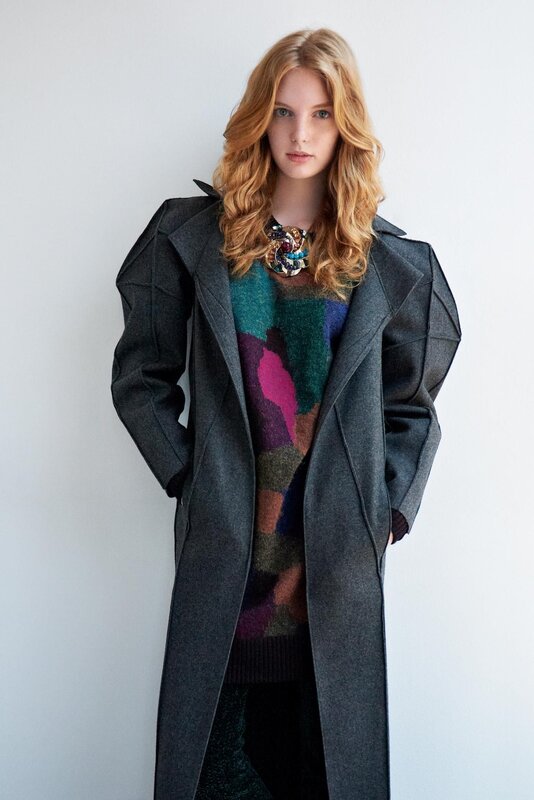 woman in a long coat