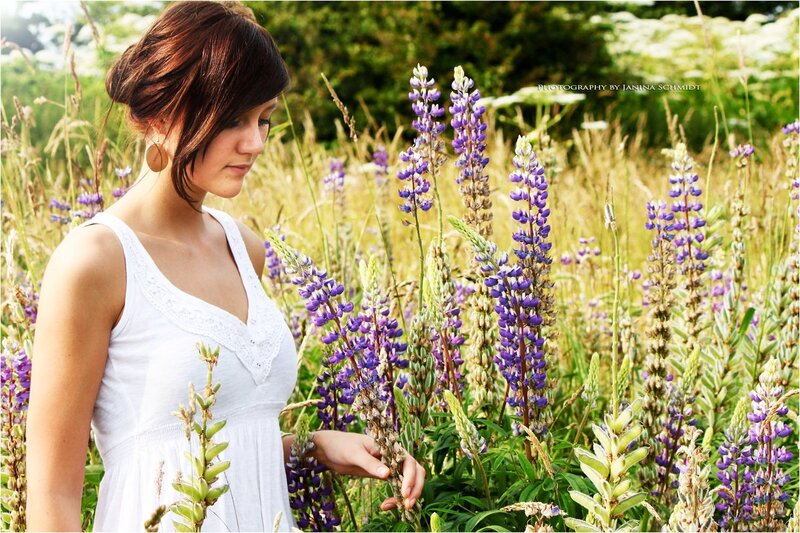 Woman in a lupine field