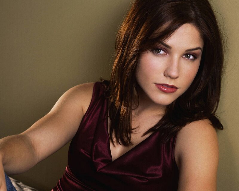 woman in a maroon dress