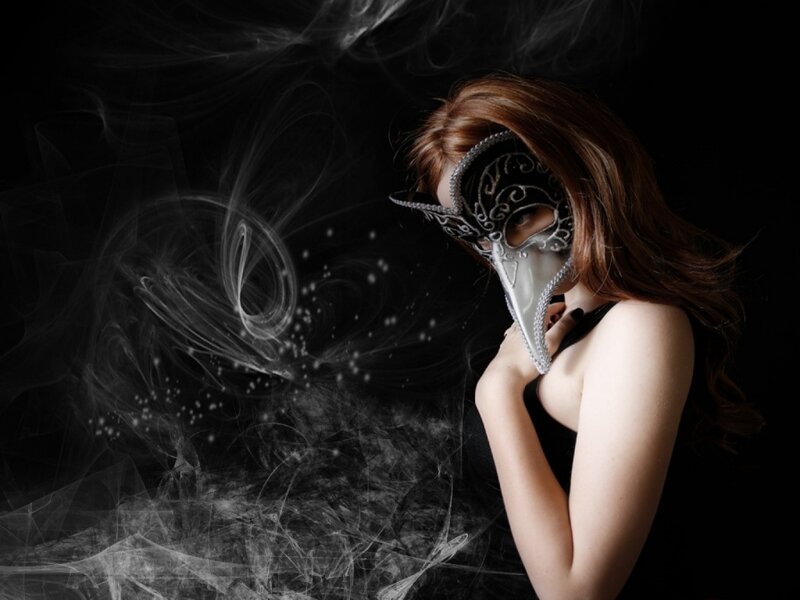 woman in a mask with smoke