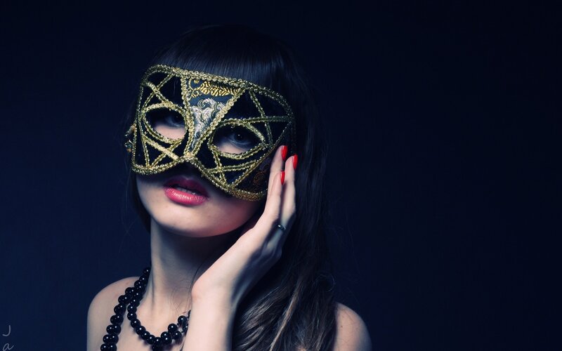 woman in a masquerade mask