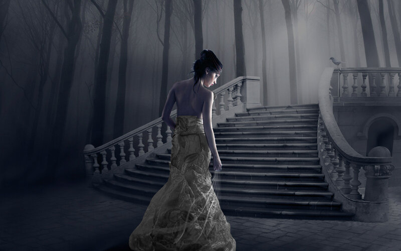 Woman in a misty forest