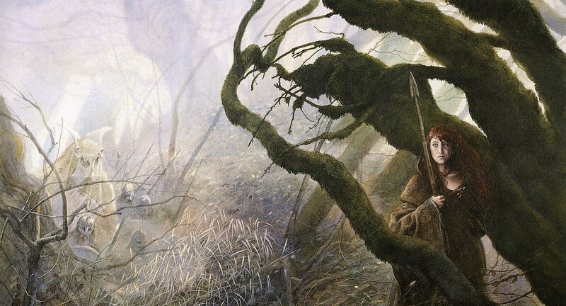 Woman in a misty forest