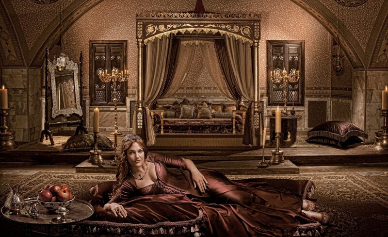 woman in a palace bedroom