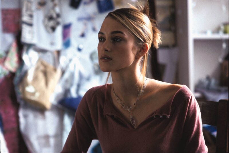 woman in a pink sweater