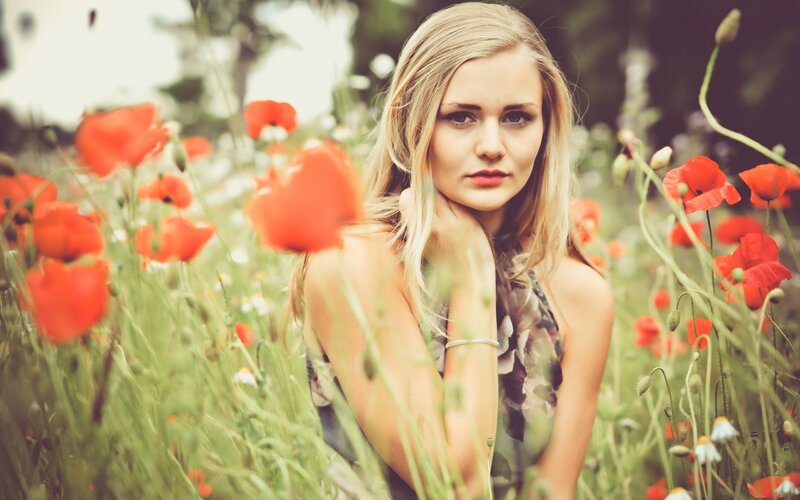 woman in a poppy field