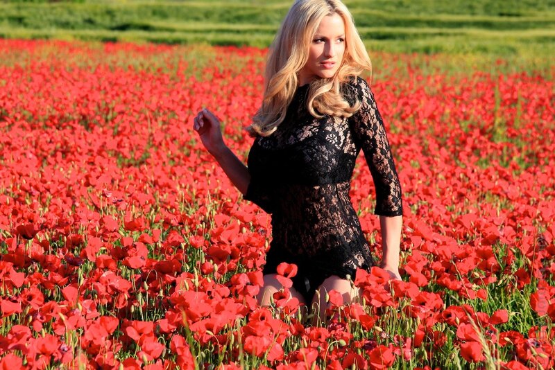 Woman in a poppy field