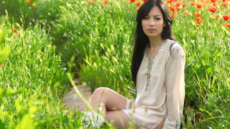 woman in a poppy field