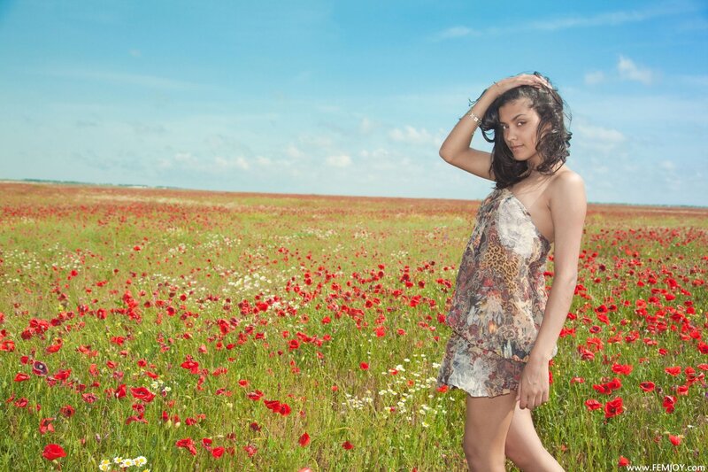 Woman in a poppy field