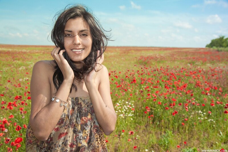 Woman in a poppy field