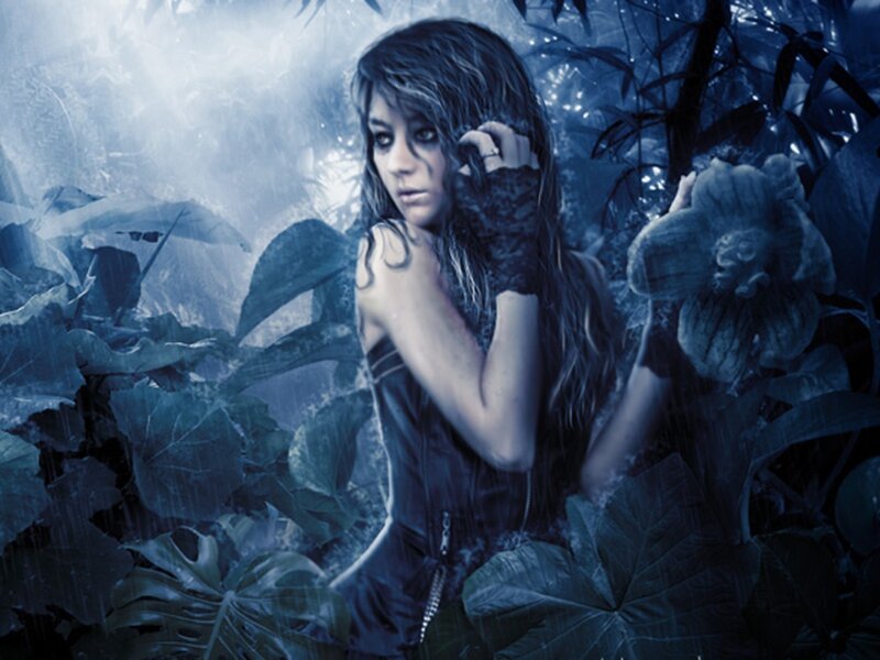 woman in a rainy forest