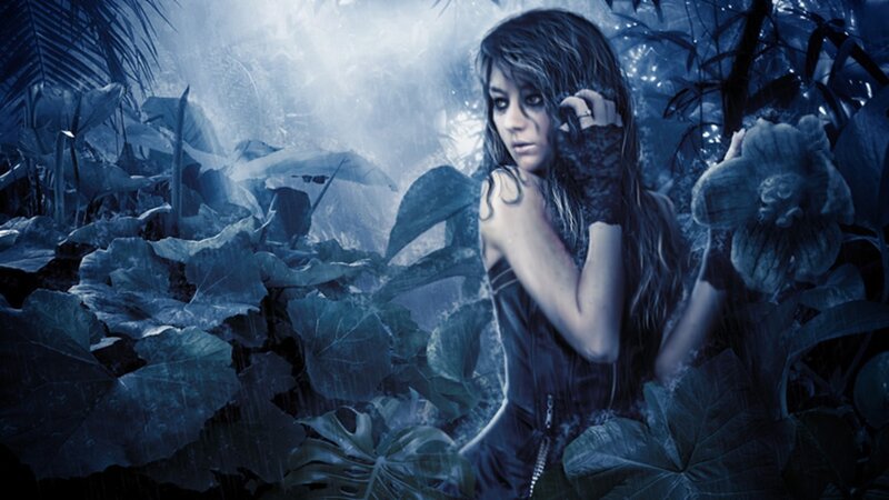 woman in a rainy jungle