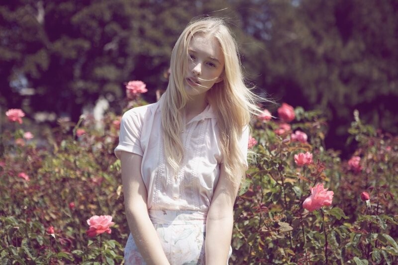 woman in a rose garden