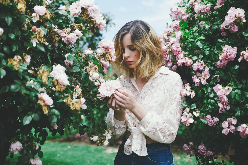 woman in a rose garden