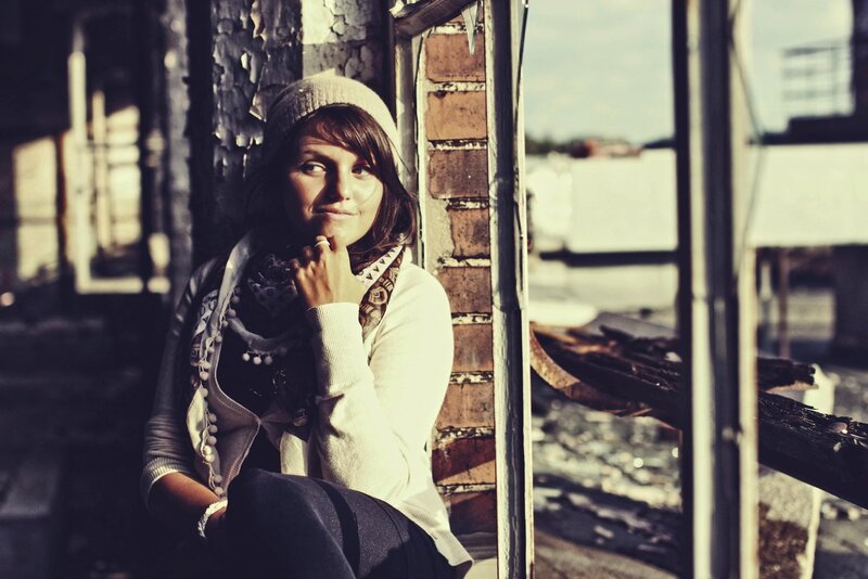 woman in a ruined building