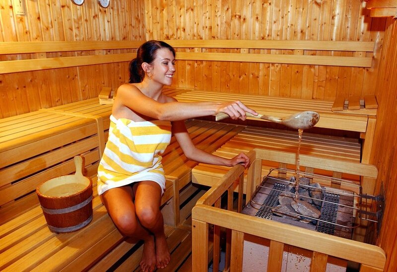 Woman in a sauna