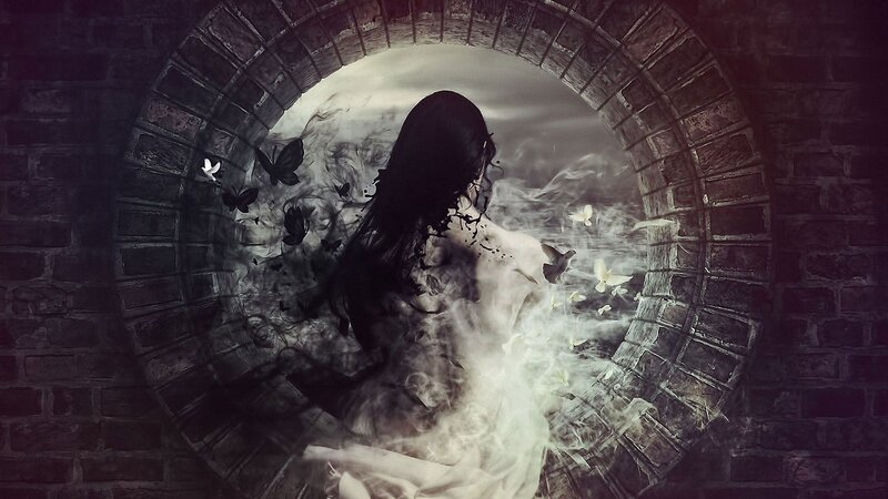 woman in a stone archway