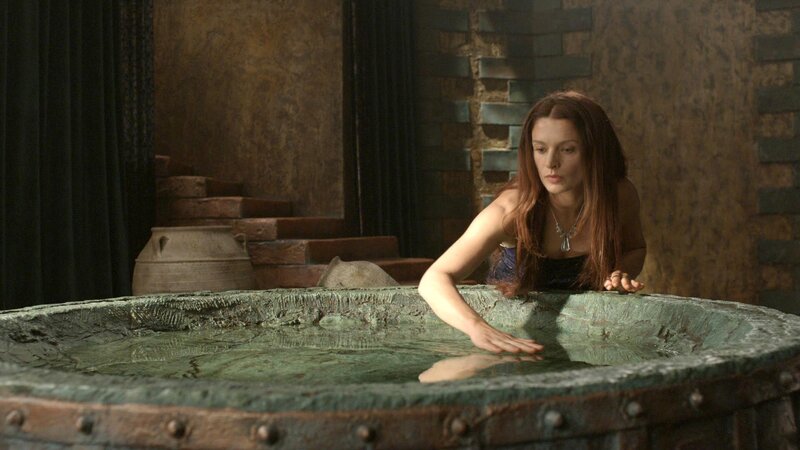 woman in a stone basin