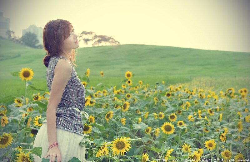 Woman in a sunflower field
