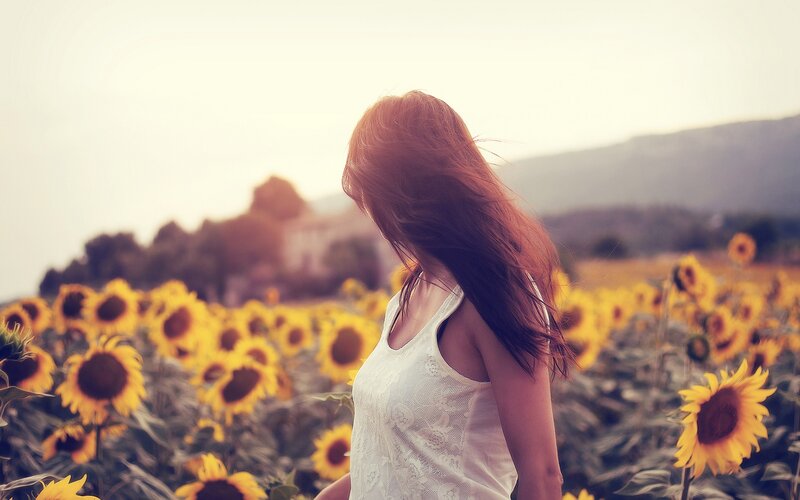 Woman in a sunflower field