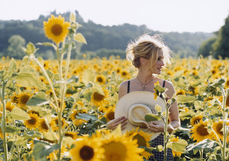 Woman in a sunflower field