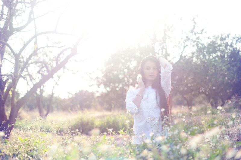 woman in a sunlit field