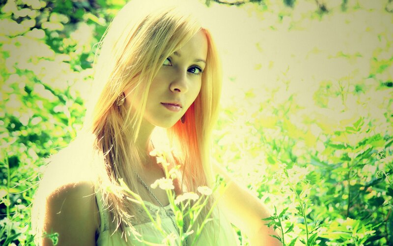 woman in a sunlit field