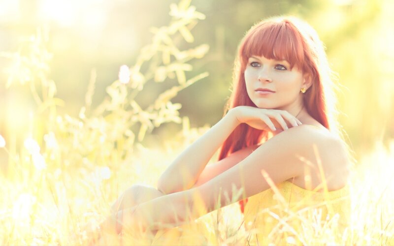 woman in a sunlit field