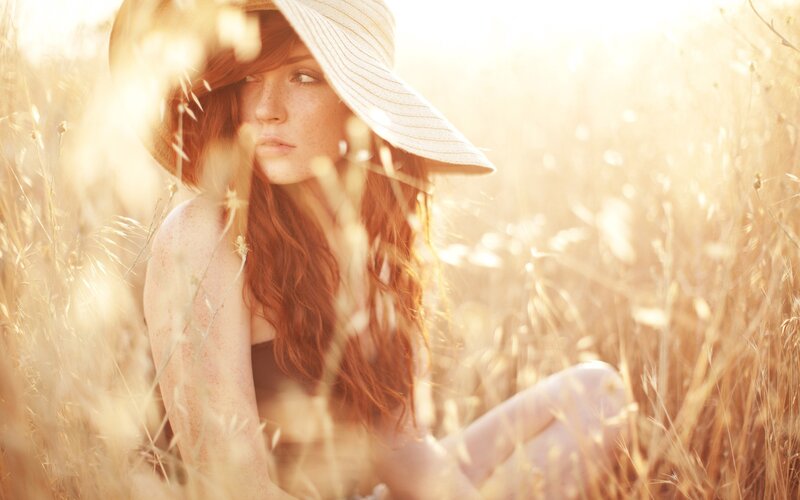 Woman in a sunlit field
