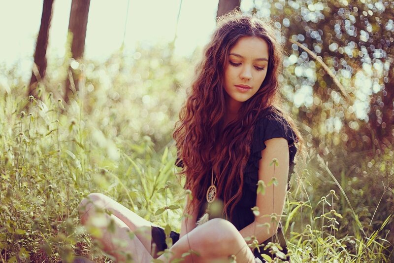 woman in a sunlit field