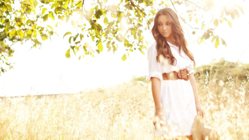 woman in a sunlit field
