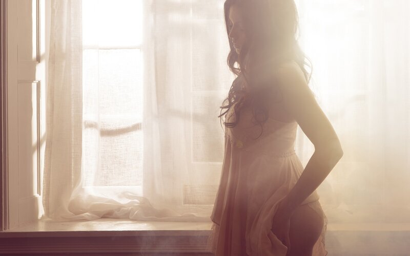 woman in a sunlit room