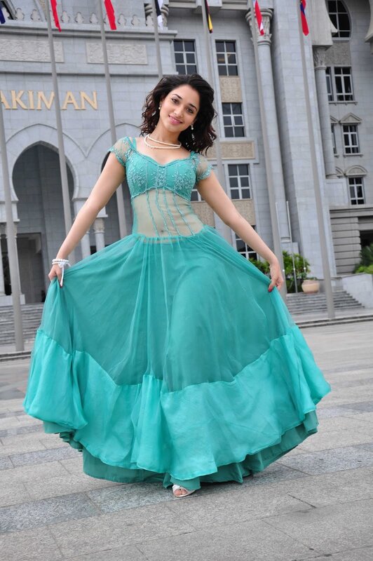 Woman in a teal gown