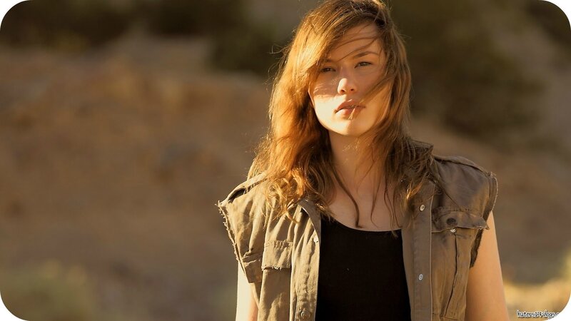 woman in a vest outdoors