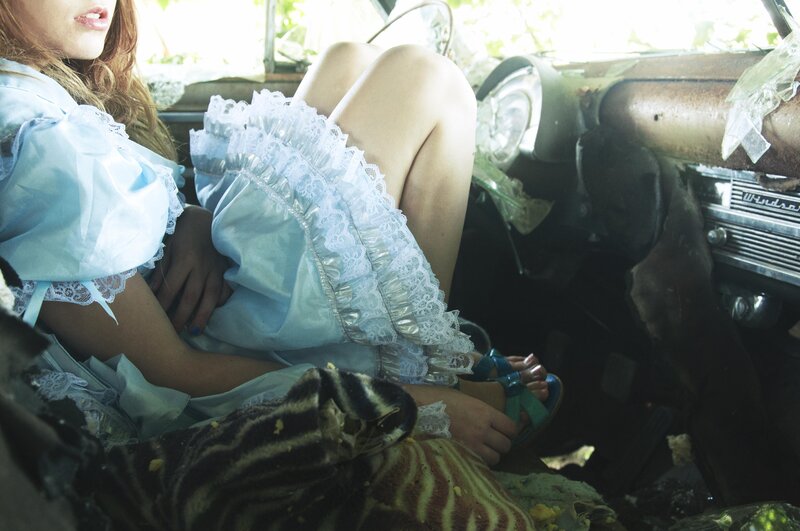 Woman in a vintage car
