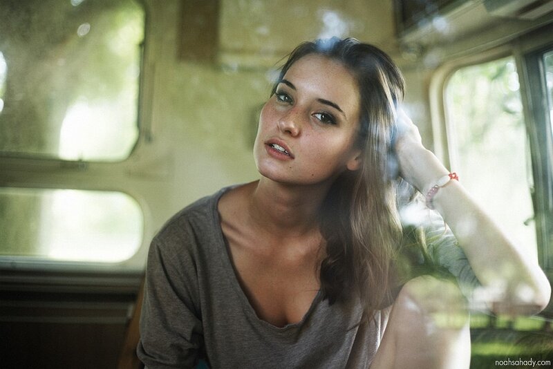 woman in a vintage vehicle