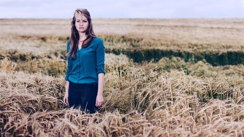 woman in a wheat field