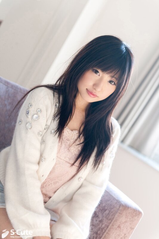Woman in a white cardigan