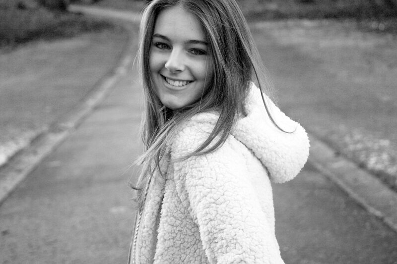 woman in a white coat