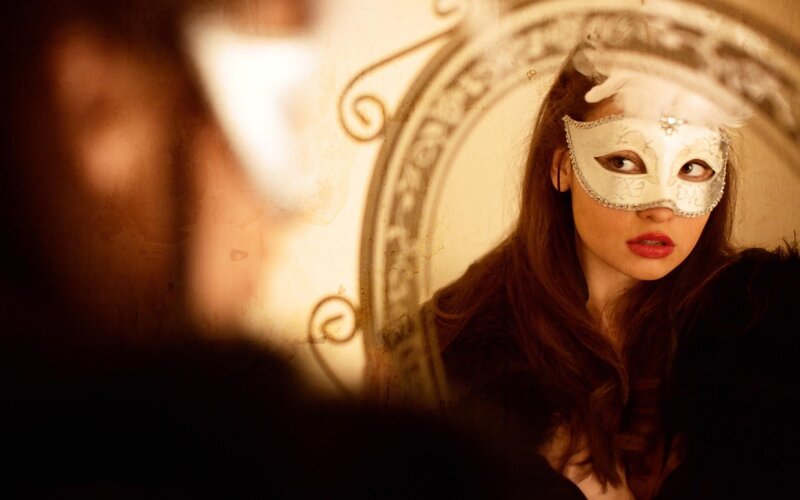 woman in a white mask