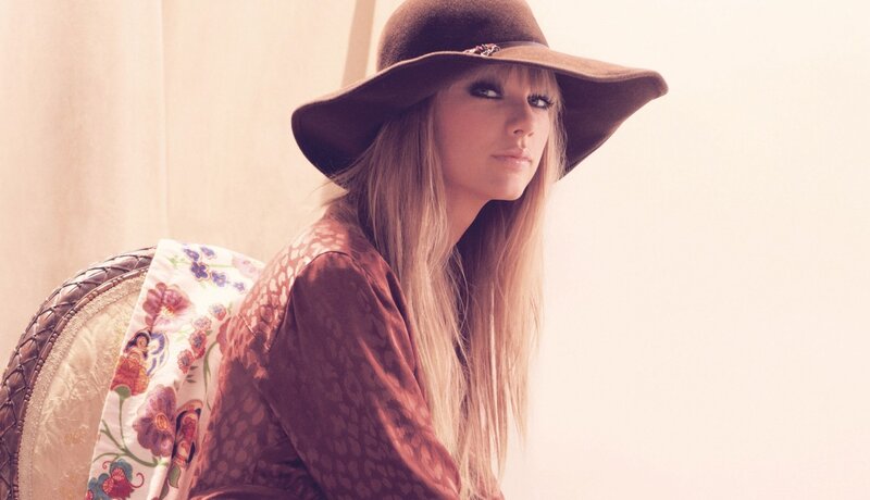 woman in a wide-brimmed hat